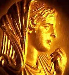 Golden profile of a woman from ancient times Golden profile of a woman from ancient times