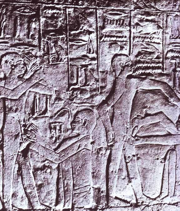 Circumcision in the Bible: Egyptian wall relief showing priests using knives to circumcise two young men