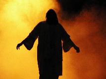 Jesus at the Resurrection: dark figure against a brilliant background