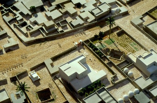 Reconstruction of ancient Egyptian houses, with dome-shaped grain silos