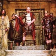 Pilate presents Jesus to the crowd, with Barabbas at right; still from the movie 'Passion of the Christ'