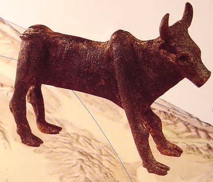 Bronze bull excavated in northern Israel. The bull, cow and calf were symbols of fertility, in crops, flocks & people.